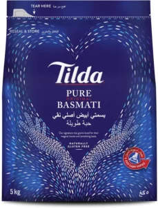 A 5kg bag of tilda pure original basmati rice, labeled gluten-free and featuring a blue design with grain motifs.